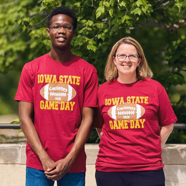 A student and parent wearing CI Sport Gameday 2026 Cyclones Script Cardinal T-Shirt